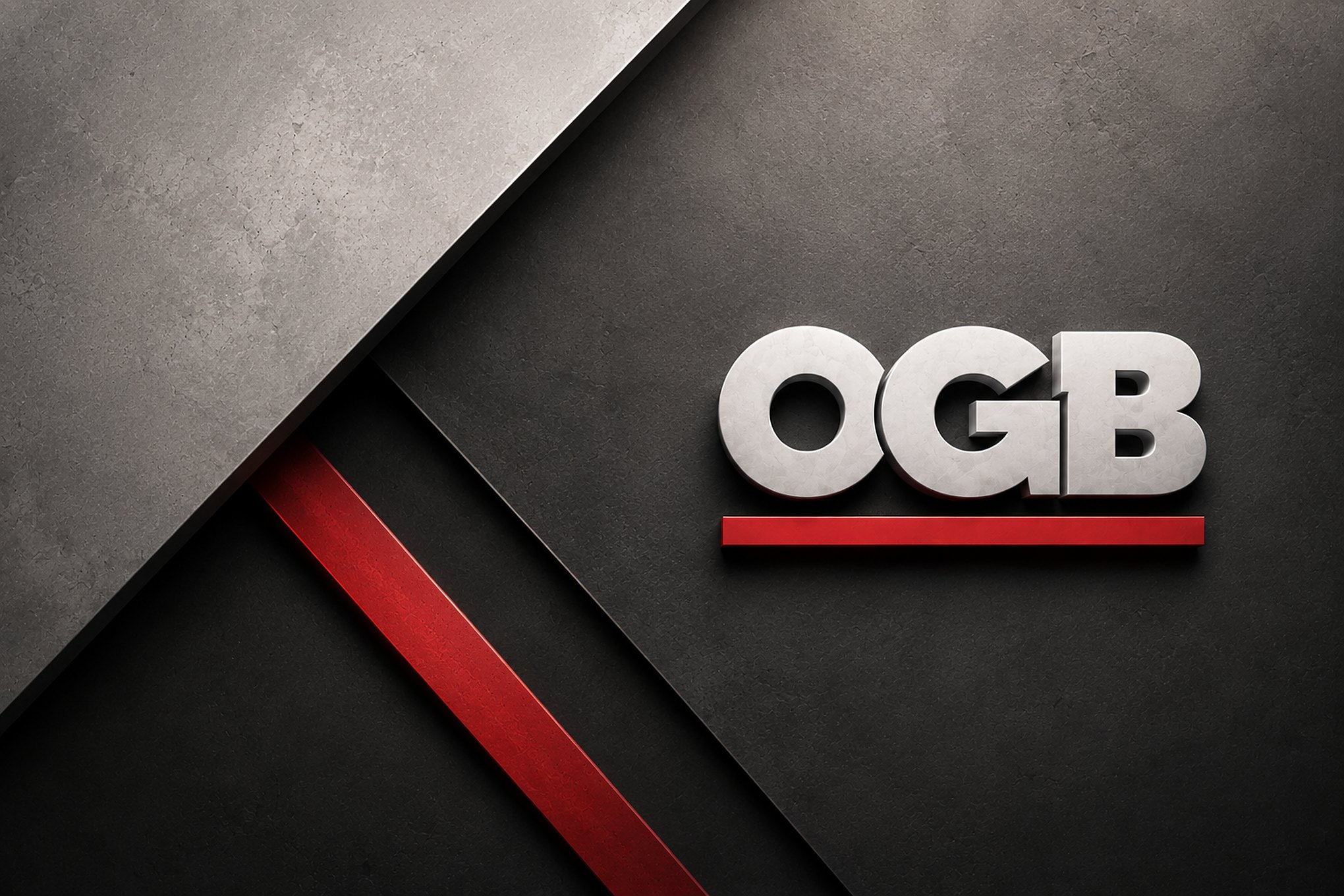 Enseigne OGB en relief sur un mur de béton
